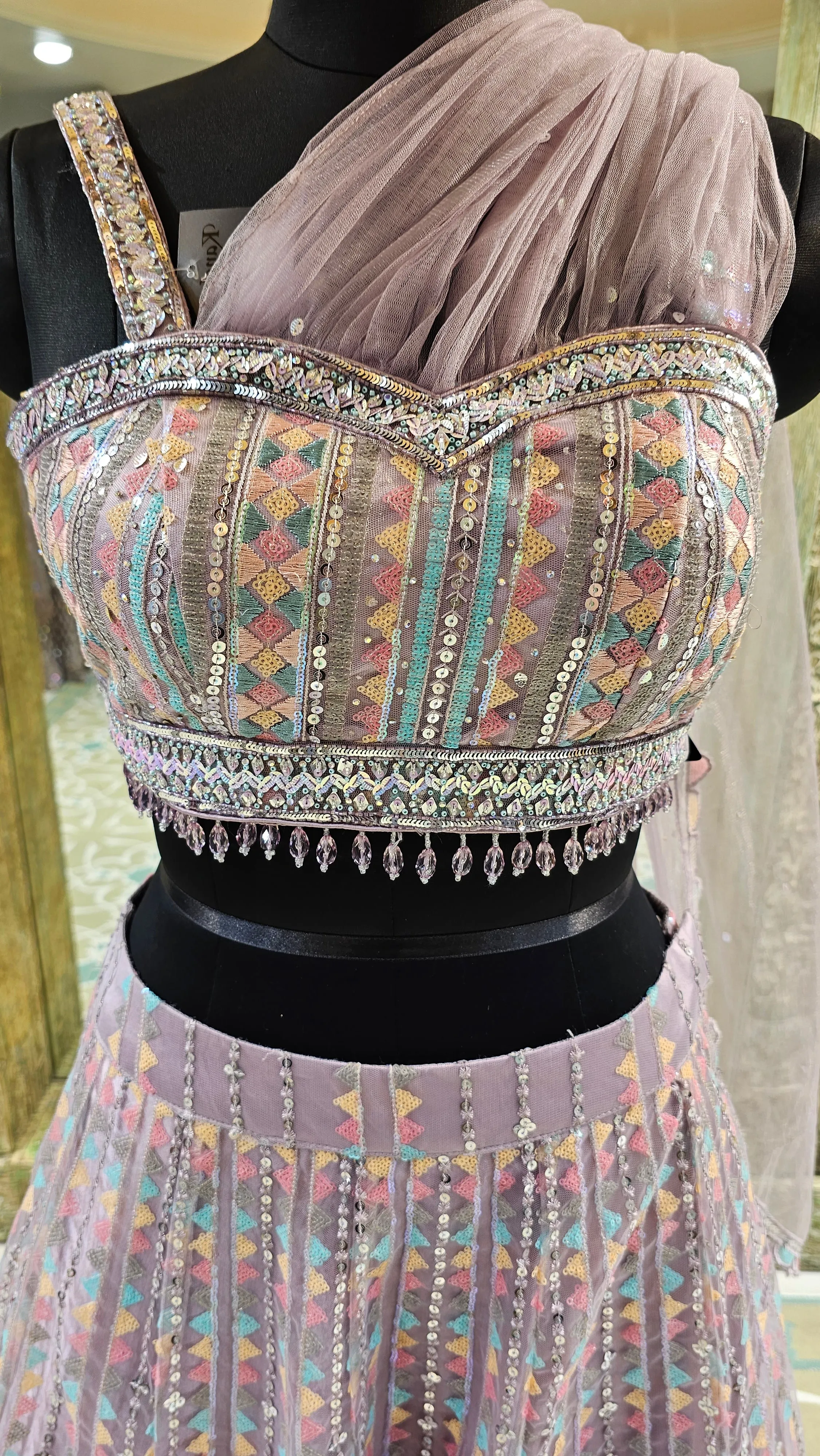 Mauve Net Lehenga Choli with Sequins And Thread Work